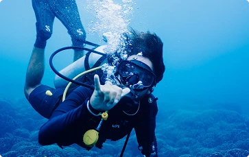 A Man Diving in Nusa Penida